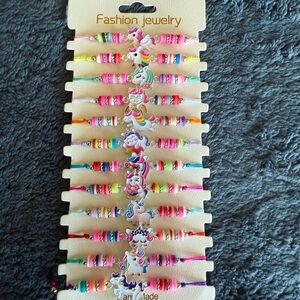 NWOT bundle of 12 kids unicorn bracelets